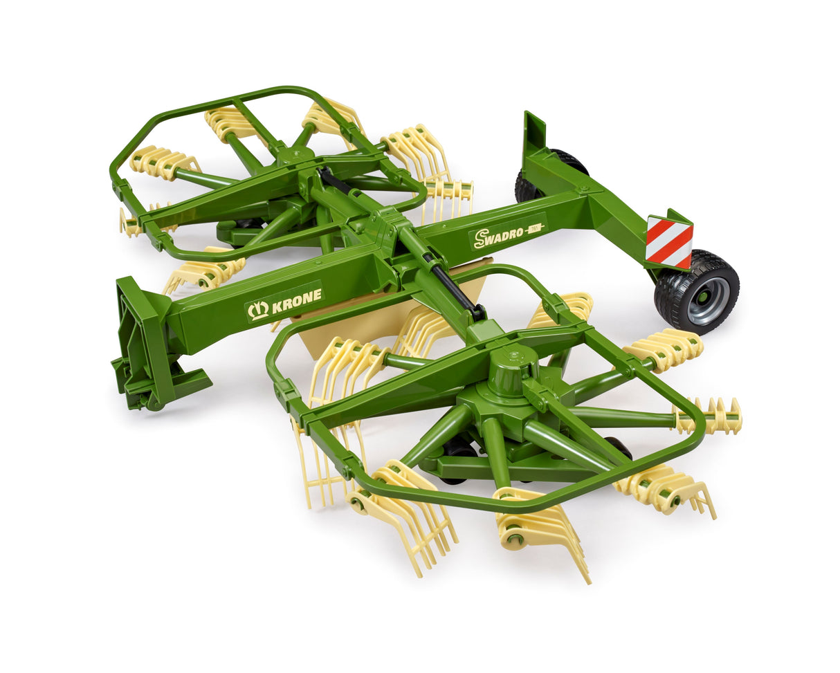 A green and yellow Krone dual rotary swath windrower toy tractor with foldable cantilever arms and a support leg, designed for compatibility with Bruder Profi series tractors.