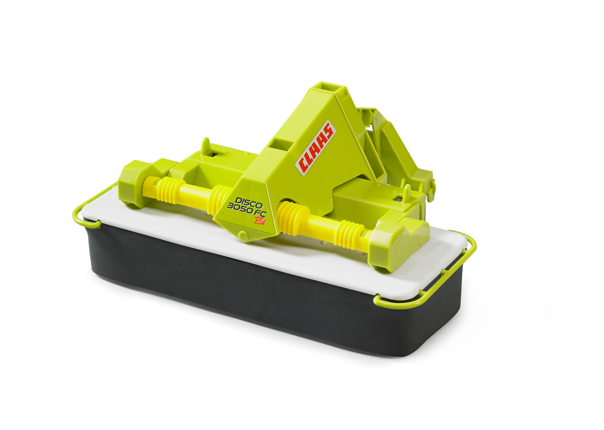 A green Claas Front disc mower toy with black and yellow details, made by Bruder.