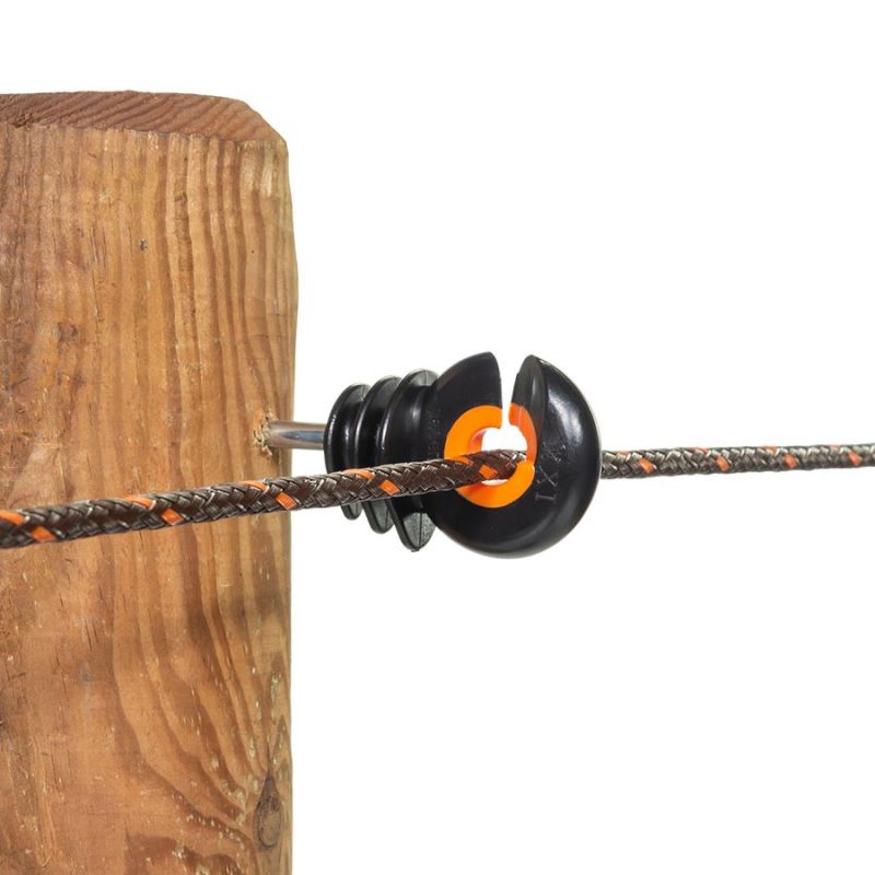 Gallagher XDI Electric fence insulator attached to a wooden post with a black and orange color scheme.