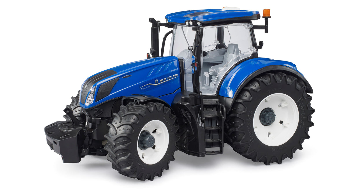 A blue and black New Holland T7.340 tractor with steering wheel, and large wheels.