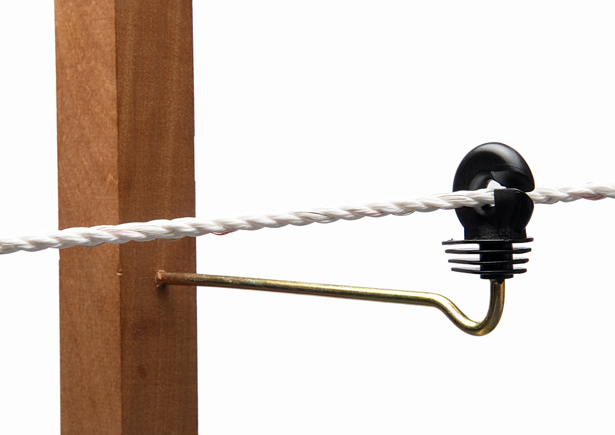 Ring insulator attached to a wooden post, designed for electric fencing to keep the wire or rope away from the post.