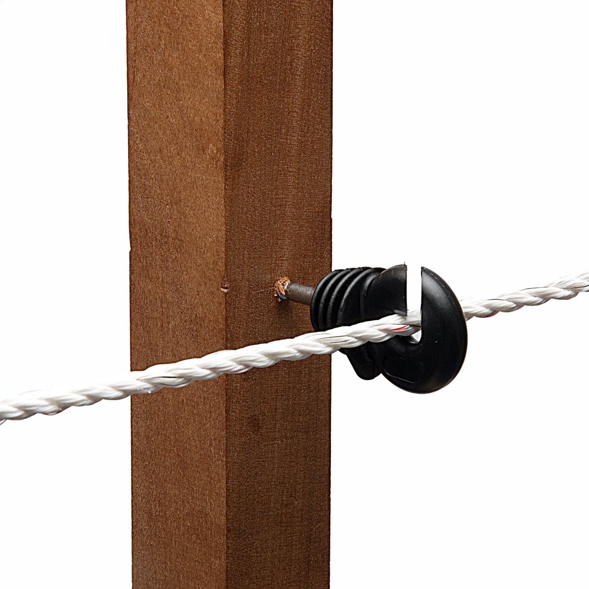 Close-up of a black, reinforced hotline screw-in ring insulator attached to a wooden post, with a white wire or rope passing through it.