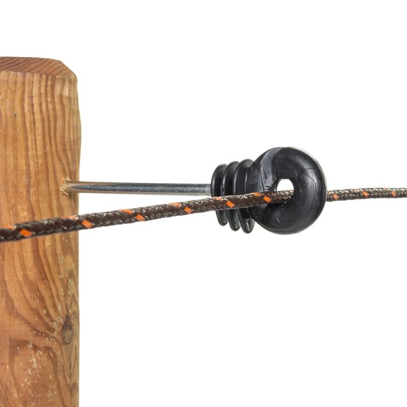 An offset screw-in insulator for wooden posts, without metal core, installed on a fence line with a poly wire.
