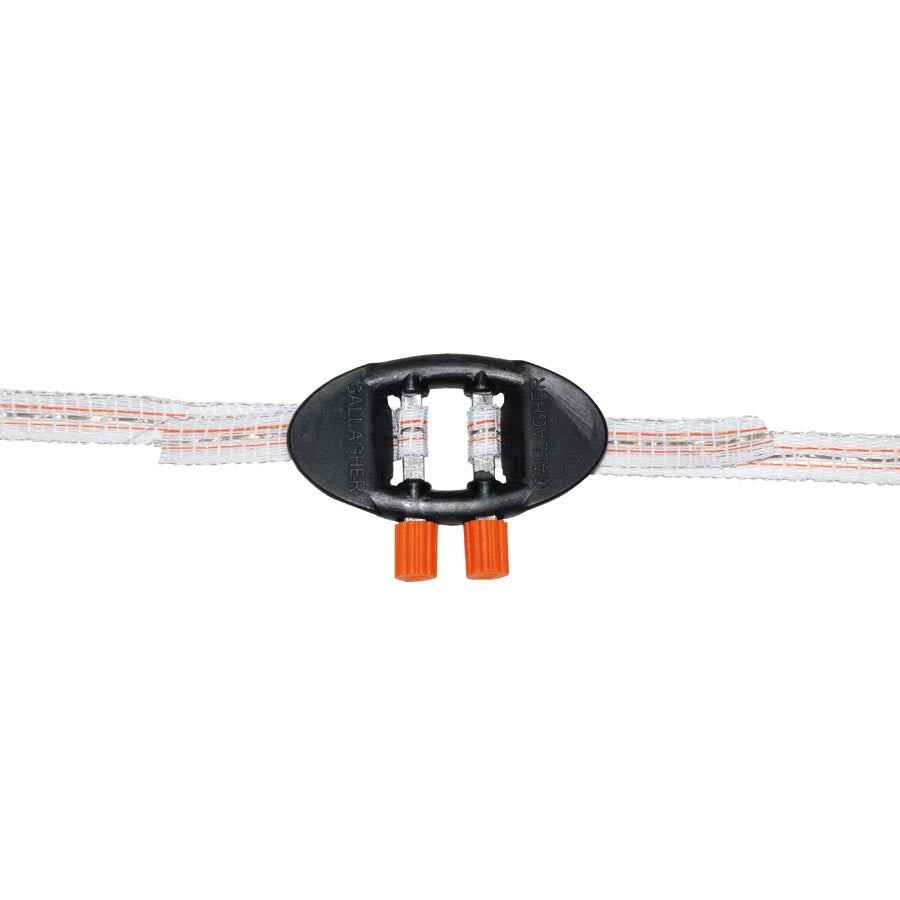 A black Gallagher tape joiner with orange rucksack clips on either side, designed to connect electric fence tape.