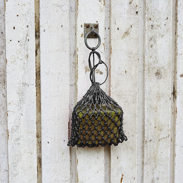 Small net for suspending chicken enrichment blocks