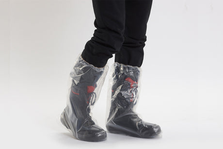 disposable clear plastic over boots with rubber band at the top