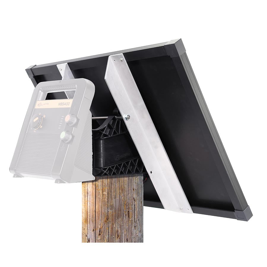 A Gallagher solar panel kit mounted on a wooden post, featuring a silver metal bracket and black panel.