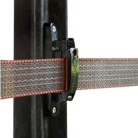 A close-up of the Gallagher TurboLine horse insulator clamped on a tape to a post, designed for electric fencing.