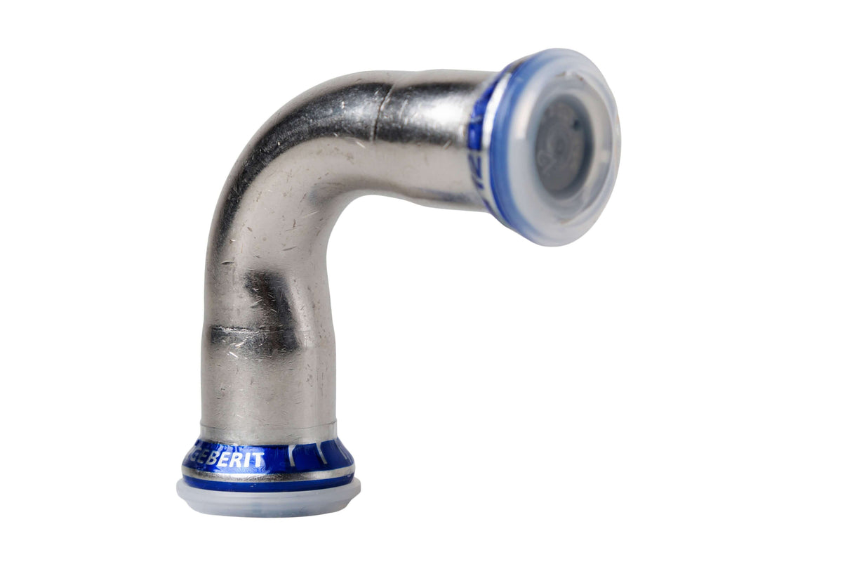 A stainless steel PressFix Coupling W12 Elbow for Lubing Top-Climate Misting System.