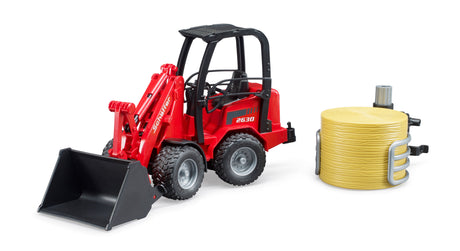 Schäffer Compact loader 2630 with bale gripper plus bale - Farm Toy