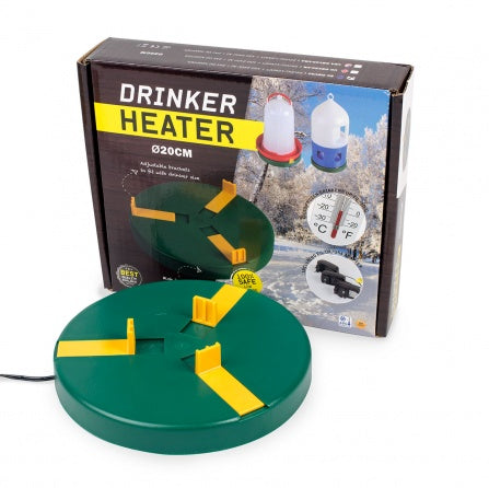 Green drinker heater with yellow accents in front of its packaging box.