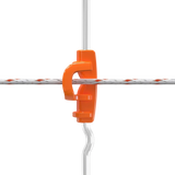Orange clip on a gallagher post